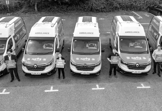 An ambulance fleet photographed from above with crew