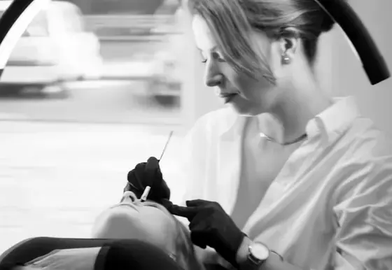 A Boyana Brows technician at work, close up
