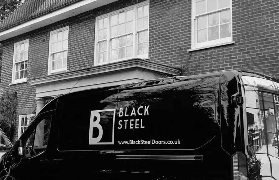 A branded van outside a customer's house